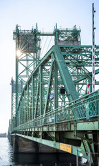 Arched drawbridge Columbia River Interstate Bridge with towers and balances and separation of flows...