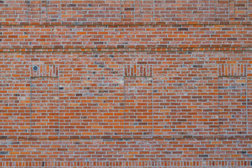 New brick wall made of old red brick.