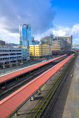 Complex modern multistory apartment buildings near the long covered platform of the old railway station in Portland