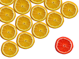 Many orange orange slices and one red slice. Not like everyone else.