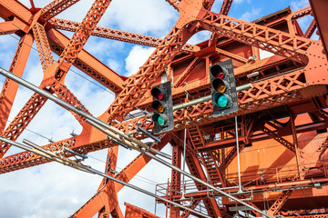 Traffic Lights with Green Lights on Red Broadway Drawbridge Truss Construction