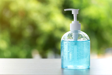 Fototapeta na wymiar hand sanitizer gel for hand hygiene on green background, health care concept.corona virus protection.
