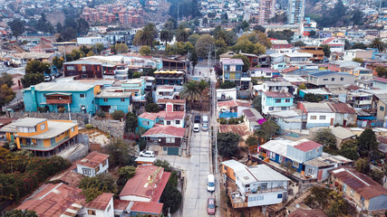 Fototapeta na wymiar Aerial View to the Colofrul and Bright Buildings and Streets of Valparaiso, Chile