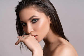 Beautiful woman with perfect professional make-up, smokey eyes