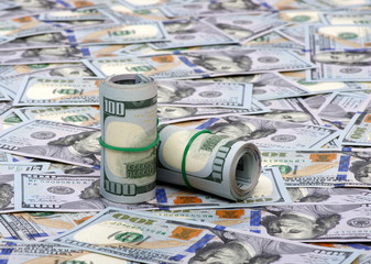 Hundred dollar bills rolled