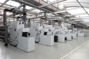 Factory for the production of threads and fabrics