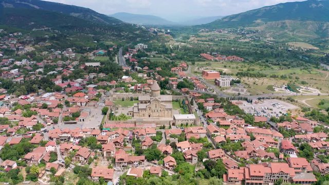 flight over of the Mtskheta, The Old Town Lies At The Confluence Of The Rivers Mtkvari And Aragvi. Svetitskhoveli Cathedral, Ancient Georgian Orthodox Church, Unesco Heritage In The Center.