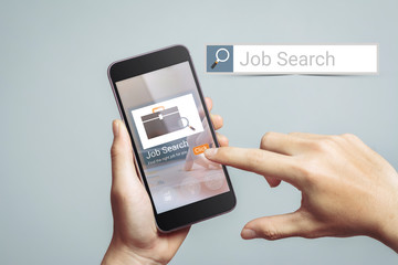 Job Search Career Recruitment  Concept. The hand is pressing on the mobile phone screen and touch the click button. at online website