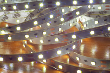 LED strip on a wooden table, close-up