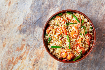 Asian rice with shrimps on a marble background