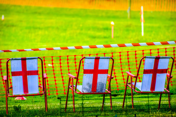 St George's cross on back of chairs on sports day in Beetham UK