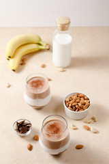 Chia seeds pudding with chocolate and banana smoothie in a glass