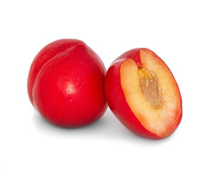 plums on a big background, isolate. bright plums black or red without background.