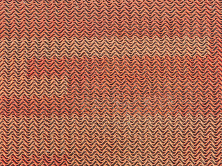 The texture of the plastic grille is red. Wave pattern