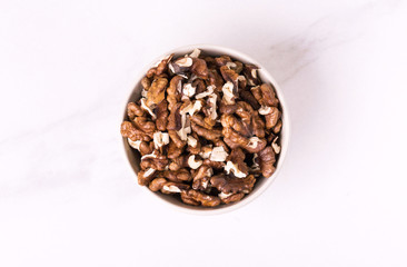 Walnut in bowl. unshelled nuts. vegetarian protein
