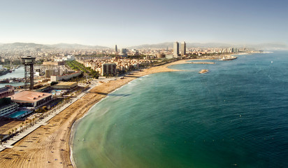 Obraz premium Barceloneta beach at sunset from aerial view, Barcelona