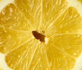 texture of half a yellow ripe lemon