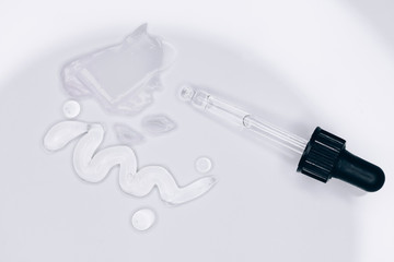 hyaluronic acid on white background. Top view, flat lay.