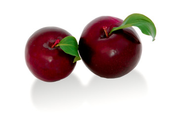 plums on a big background, isolate. bright plums black or red without background.