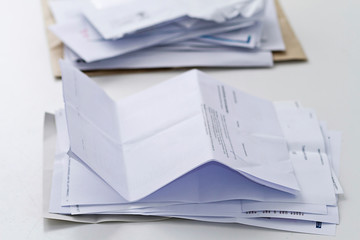 A stack of professional or invoice letters