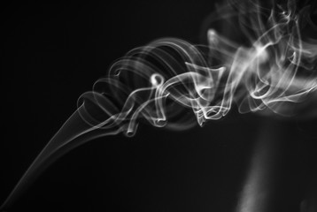 Beautiful shot of spiral smoke with black background