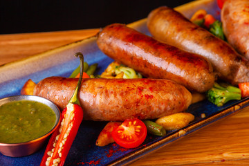 meat dish on a plate with vegetables and spices