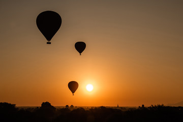 Beautiful sunrise in Myanmar with ballons