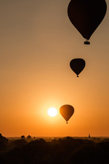Beautiful sunrise in Myanmar with ballons