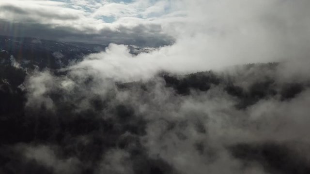Aerial Scenery shot flying through clouds