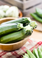 Zucchini still life on rustic wooden environment