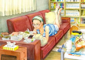A young woman enjoying binge-reading at home