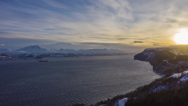 Ofotfjord Fjord and Mountains in Winter at Sunset. Nordland, Landscape of Norway. Aerial Hyper Lapse, Time Lapse. Drone Flies Forward and Upwards