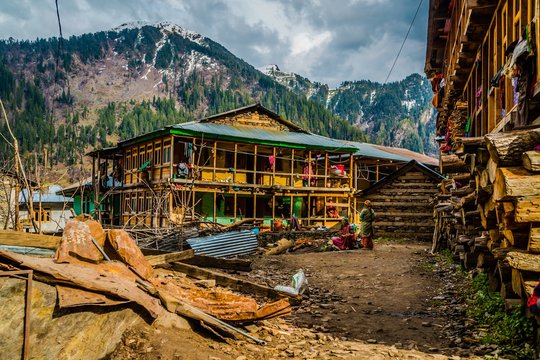 Colorful old buildings of ancient Indian village Malana in the state of Himachal Pradesh