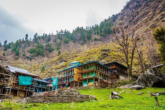 Colorful old buildings of ancient Indian village Malana in the state of Himachal Pradesh