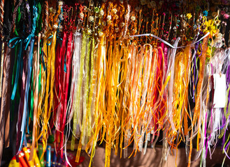 Several colorful ribbons exposed outdoors