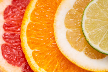 orange, lemon, lime, grapefruit and sicilian orange on a white background