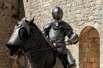Metal statue of a soldier sitting on the horse