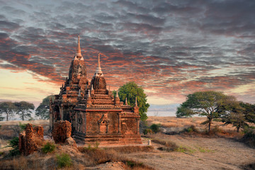 view at the valley of Bagan with its ancient buddhist pagodas while sunrise , Myanmar (Burma)
