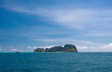 Fototapeta na wymiar Beautiful rocky island in the distance