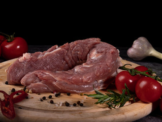 fresh raw meat on old wooden table