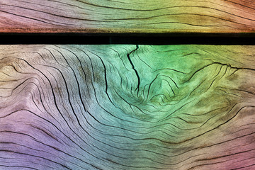 Wood grain texture planks with a rainbow effect background, Multicolor pastel, bright gradient on a hard wooden material surface. Cool pattern, bright vibrant colors. Rustic hardwood