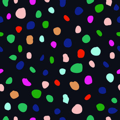 Fototapeta na wymiar Colorful fun hand drawn polka dot circle motif. Irregular layout, random composition design, emerald green, hot pink, red, blue. Elegant stylish timeless vector. Classic seamless pattern with a twist.