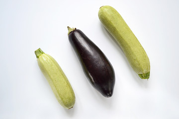 Close up of zucchini and eggplant. Isolated on a white background.
