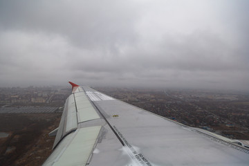 Fototapeta na wymiar View from airplane on dark sly 