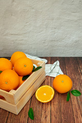 Oranges on vintage wooden floor