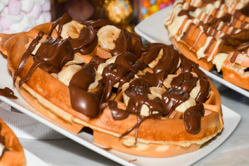 Waffles with white and dark chocolate topping