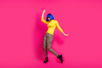 Full body photo of crazy funny lady youth strange moves students costume party wear specs yellow turtleneck blue bob wig boots leopard pants isolated bright pink color background