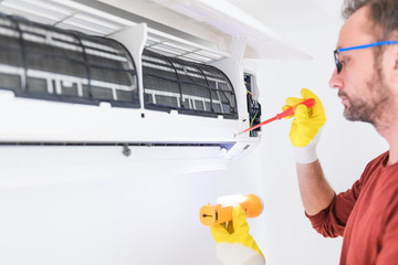 Aircondition service and maintenance, fixing AC unit and cleaning the filters.