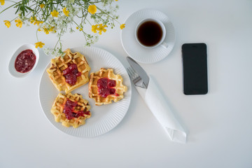 Flat lay breakfast of coffee on a white table