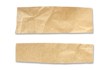 Recycled paper craft stick on a white background. Brown paper torn or ripped pieces of paper...